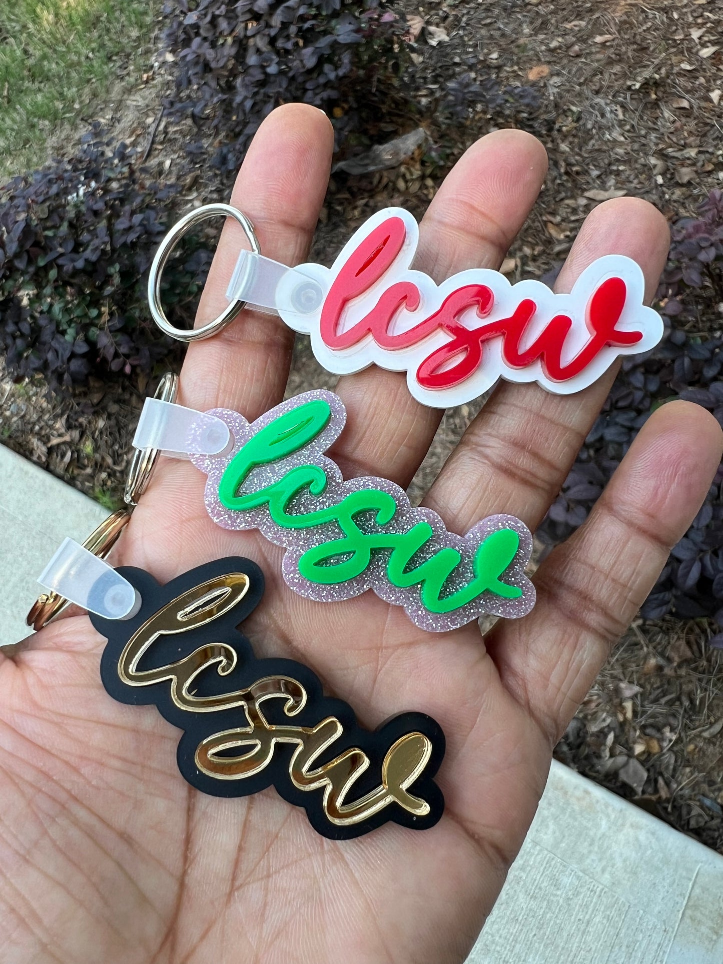 Acrylic double layer keychain featuring 'LCSW' credential badge design.